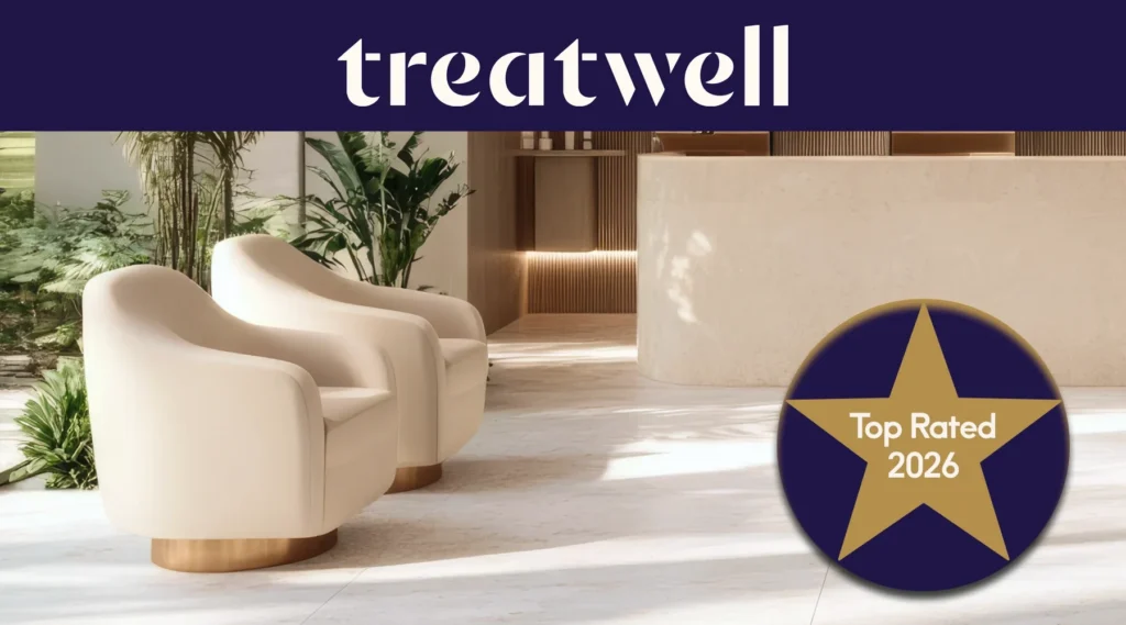 Treatwell Top Rated 2026 badge, earned through client reviews, over a bright salon reception with cream armchairs and plants